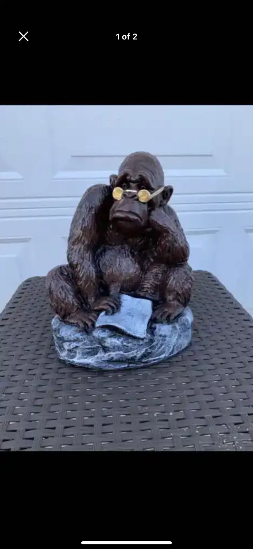 The monkey reading a newspaper statue