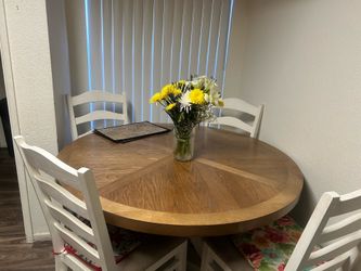 Used Dinning area table with 4 chairs