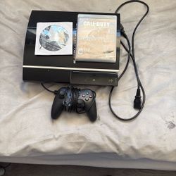 Ps3 with controller and 2 games 