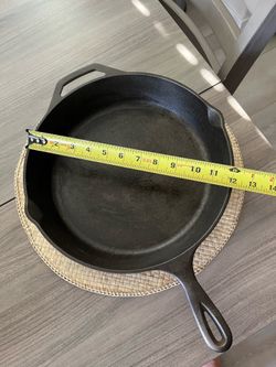 Lodge cast iron pan. Size: 12 inch.