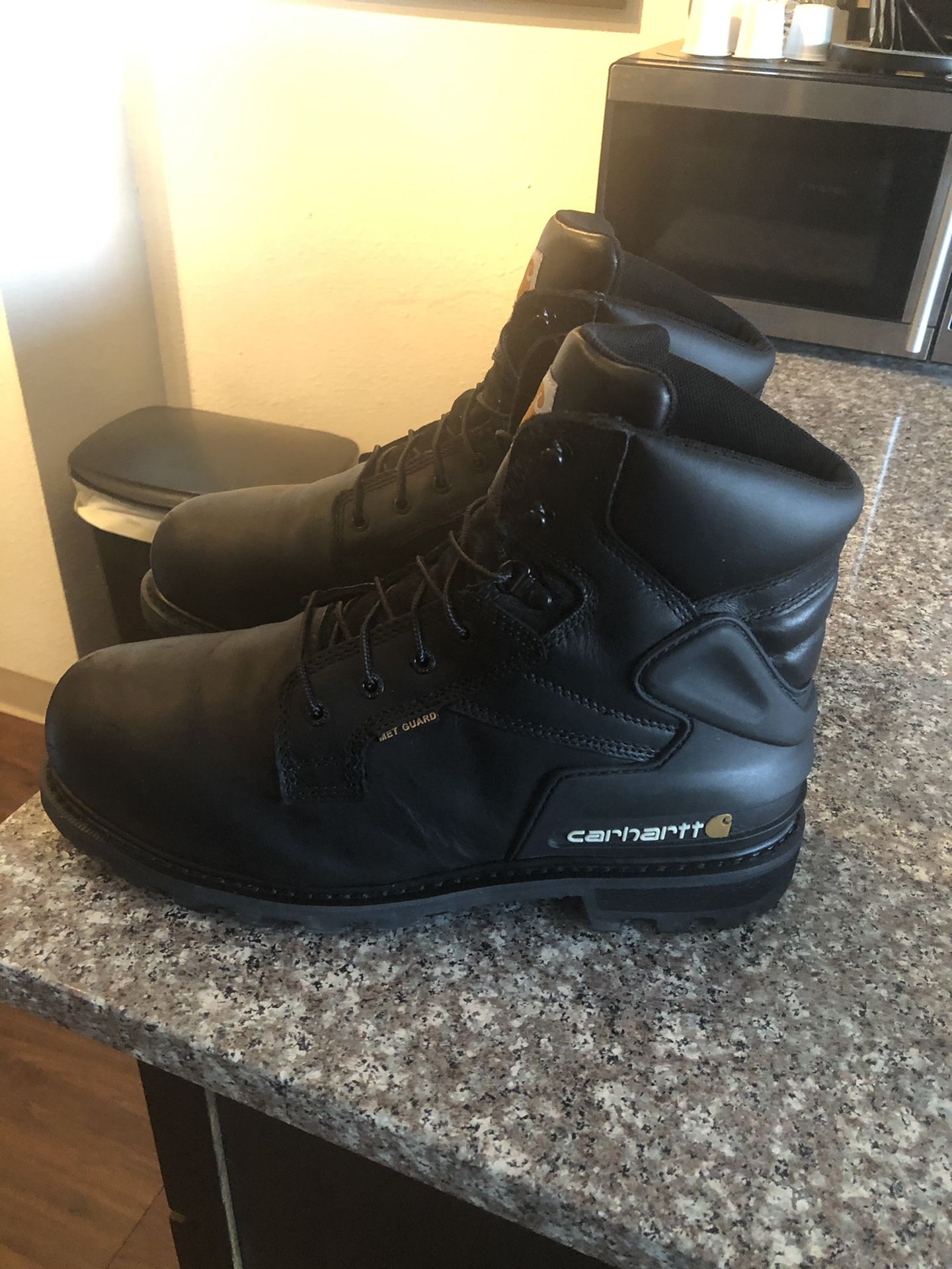 Carhartt mens size 13 work boots. In very good condition.. Serious buyers only