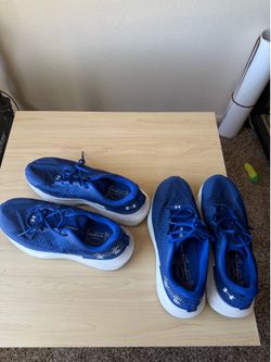 Blue under Armour, running shoes size 9.5 and 8.5