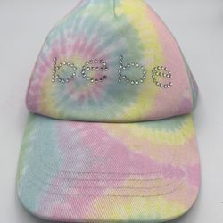 Bebe girls hat tye dye pink.  Teenagers will fit excellent condition  Brand BEBE in rhinestones  Comes from a pet and smoke free household  B29 