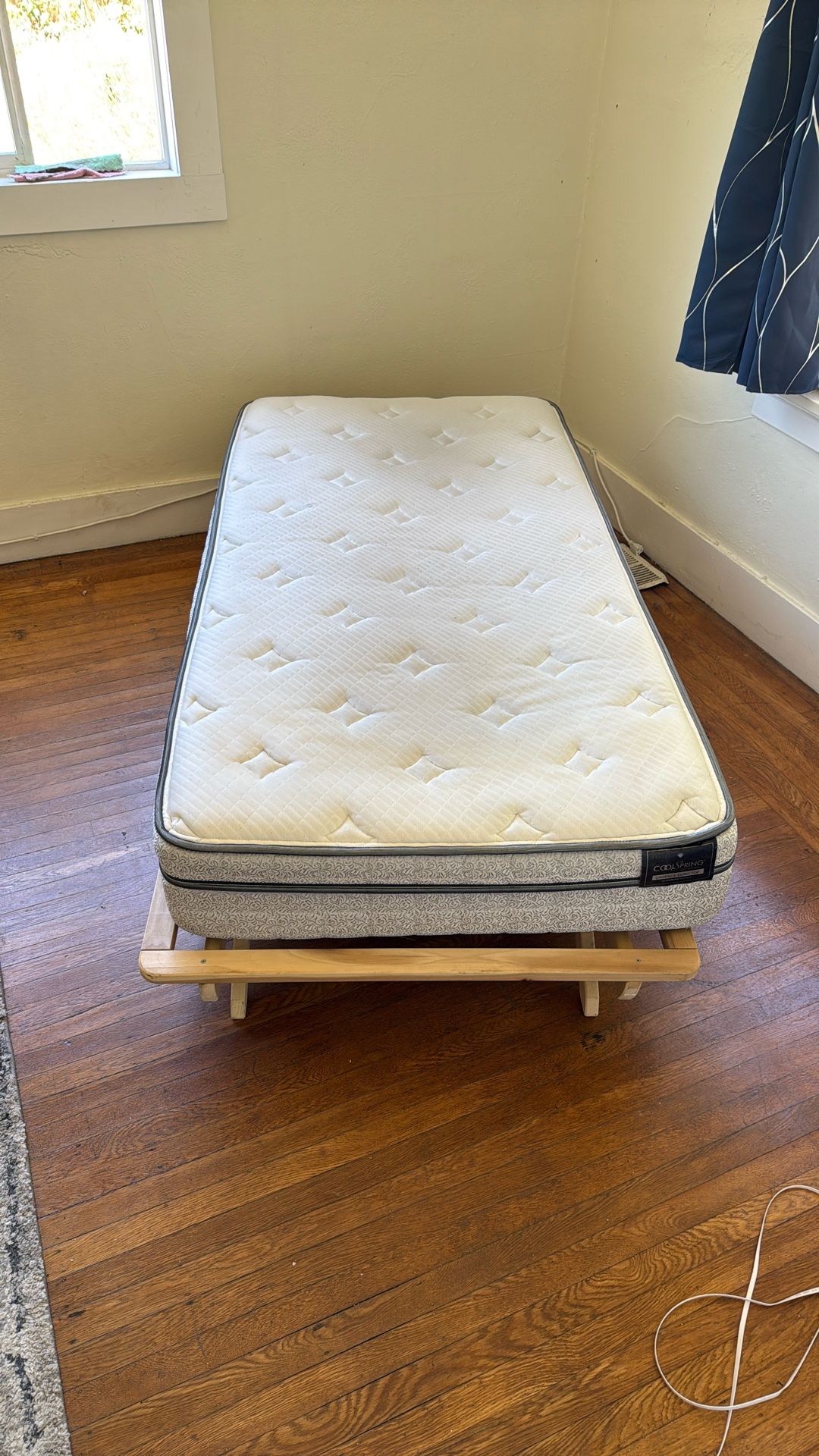 Twin mattress + Wooden bed frame