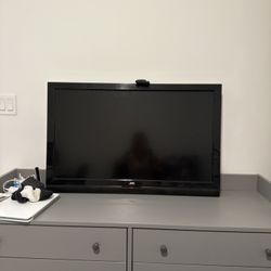 Futon, Desk, Chair, Printer, TV