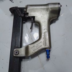 Senco Model L pneumatic staple gun