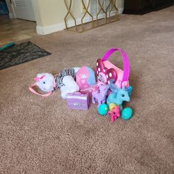 My Little Pony Dolls, Minney Mouse Toys, And A Kitty Pruse.