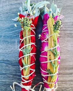 Sage rapped in roses and palo santo
