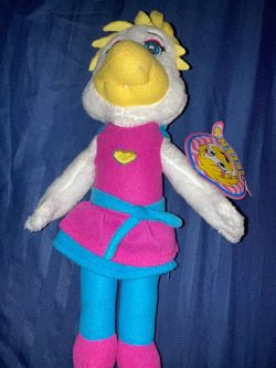 Chuck E. Cheese Helen Henny plush doll, likely an 11-inch version produced around 2015.The tag features a vibrant graphic of Helen's face with her nam