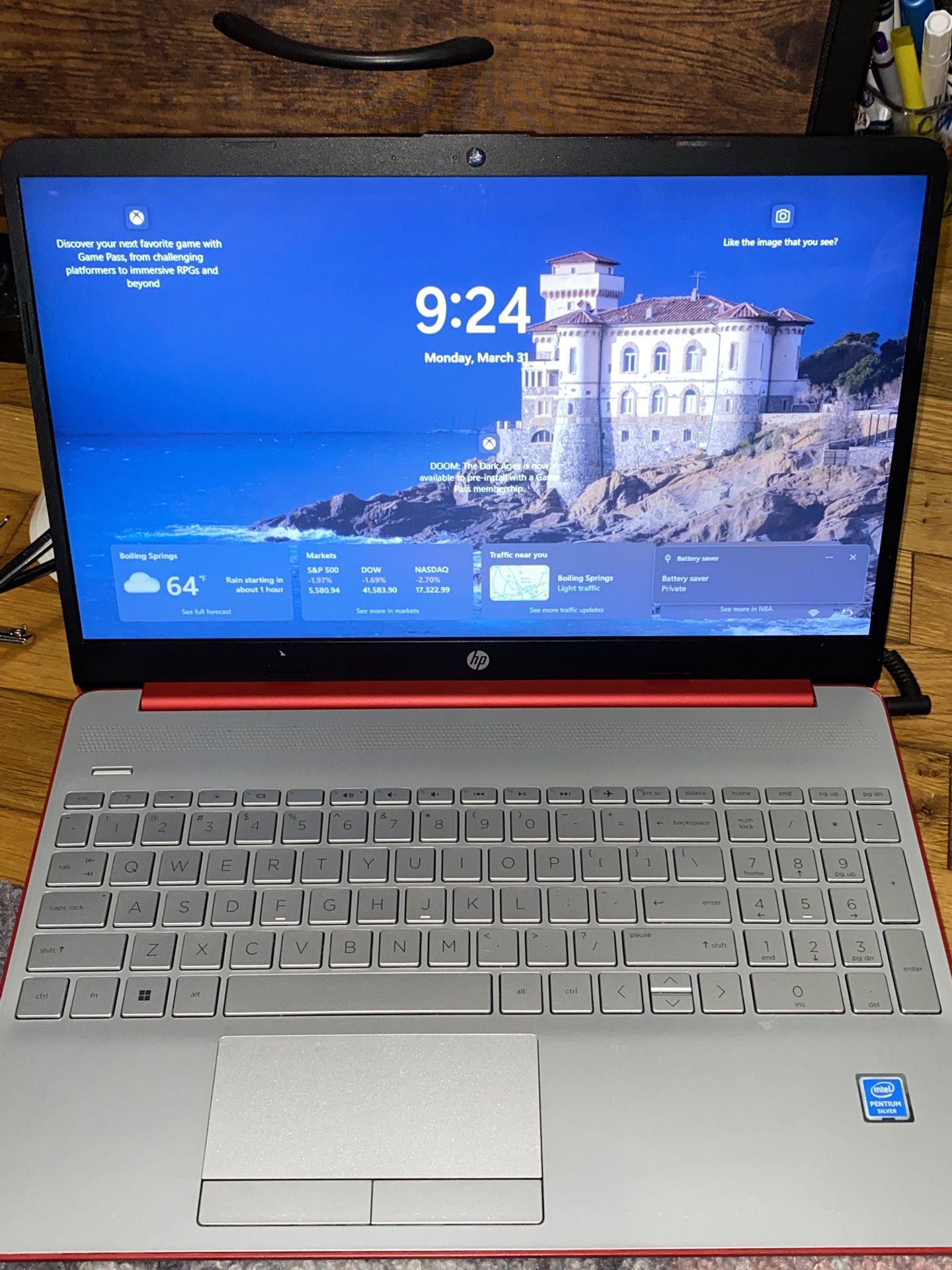 HP 15-DW0083WM laptop with its power adapter