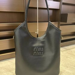 Miumiu's new hobo tote bag with an armhole design