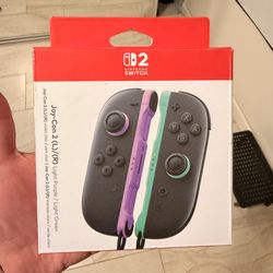 Nintendo Switch 2 Joycons Purple/green