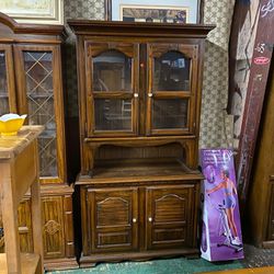 Glass Paned Hutch with Cabinet and Organizer Drawer in Dark Finish. $120. 42”L x 17”W x 78”H.