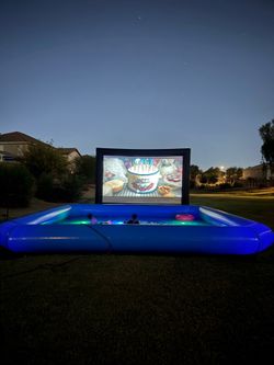 Backyard movie night pool inflatable & screen
