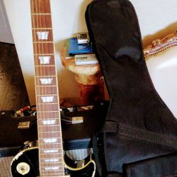 12 Strings Les Paul Kona, Set Neck Solid Body Rare Black Beauty, Performing Great Sounds +with a Gibson Gig Bag; Look At My Other Ads Thanks.