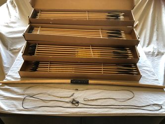 New English 60 pound long bow custom-made with 24 balance match 175 grain broadhead arrows and 24 175 grain field tips all new