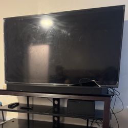 65 in TV And Stand