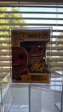 Smile Entity autographed Funko Pop