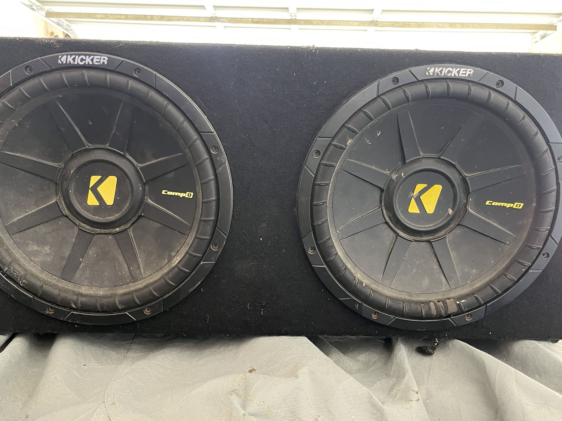 Two 12 Inch Kicker Subwoofers And Amp