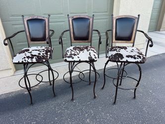 Set of 3 Cowhide Swivel Bar Stools with Arms