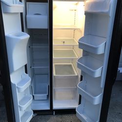 Side By Side Frigidaire refrigerator with ice maker