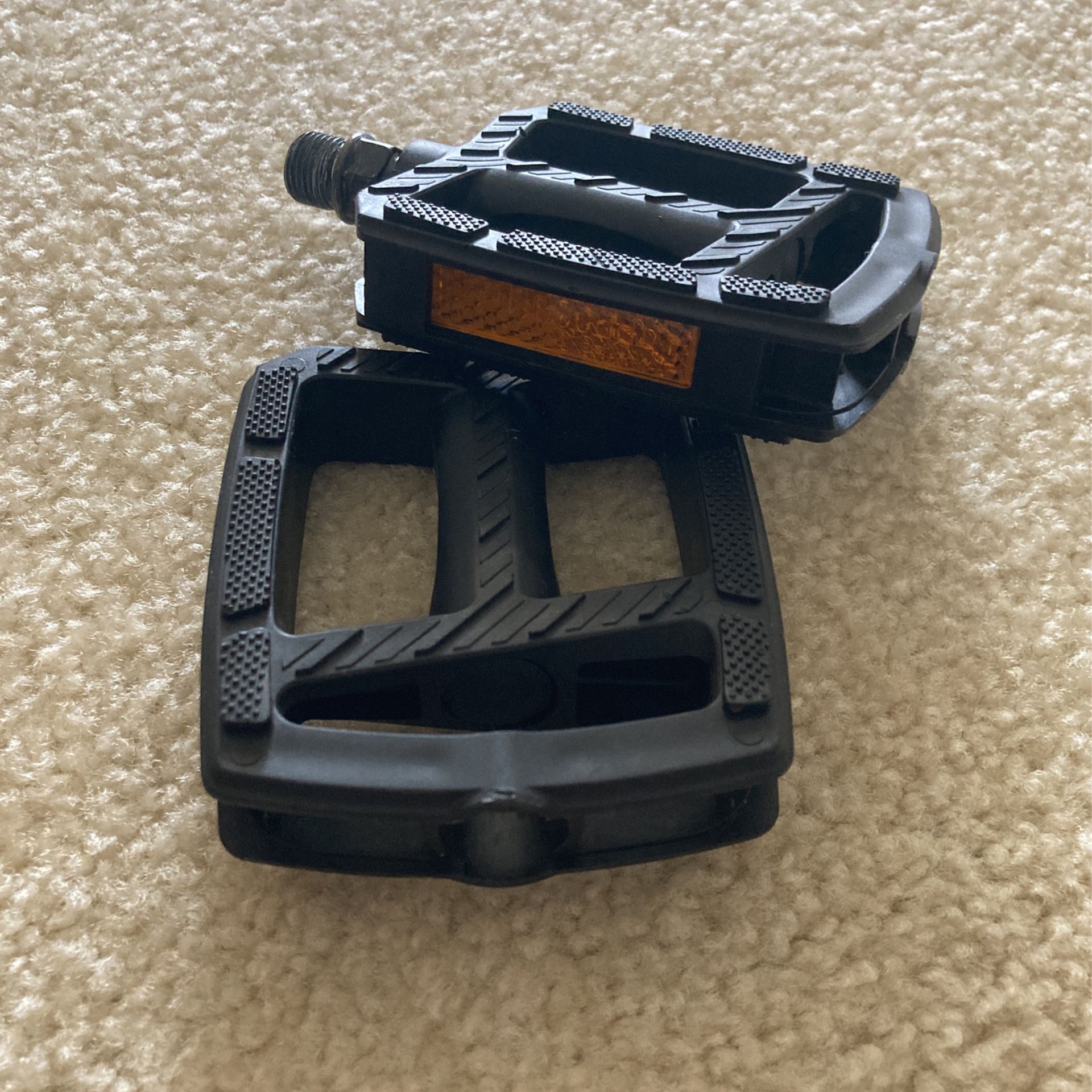 Standard bicycle pedals never used.