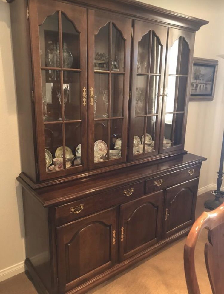 Cherry 2 piece hutch with glass shelves and lights inside