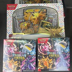 Pokemon 151 zapdos and Paldean fates booster bundles
