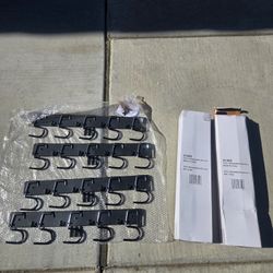 Wall hangers for brooms, mops ad small utilities.