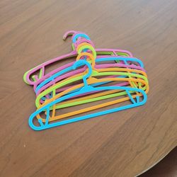 10 Set Of Kids Size Hangers 