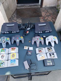 Nintendo N64 with 2 Controls. Red Expansion packed. 2 memory Controls. Games & All Cables $300! Each bundles or $525 all. Or trade up