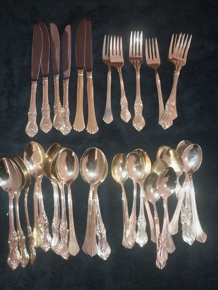 Vintage early 1970's Gold plated silverware from Kingston Jamaica 38 pieces. Beautifully intricate patterns. Comes with a Cherry Wood box with velvet