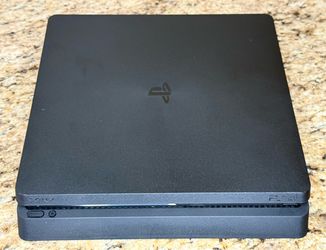 PlayStation 4 Slim Bundle + 2 Genuine Sony Controllers. Fully Functional