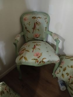 Mint green parlor chair like new with matching throw pillows. Pattern has passion flowers and birds.