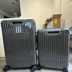 Rimowa essential grey luggage set with receipt 