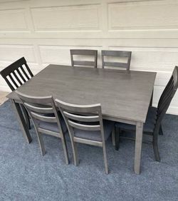 7-PC GRAY FINISH DINING SET (DINING TABLE AND AND 6 PADDED CHAIRS)