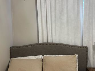 Gray Upholstered Headboard with Nailhead Trim