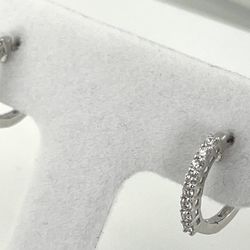 14 K White Gold Huggies’ Earrings. 0.23 Carat Diamond 
