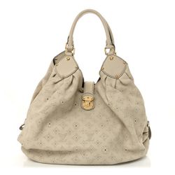 Louis Vuitton 
Mahina XL  Ivory, $1,320.00obo Retails $4,900.00 