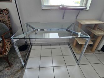 Glass desk with chrome frame