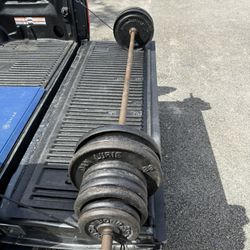Huge Set Of Weights With Solid Steel Barbell 