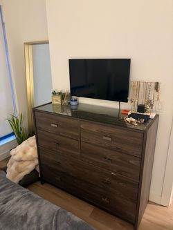 Dark Wood 6-Drawer Dresser with Glass Top