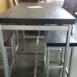 Black And Silver Counter height table With 4 stools