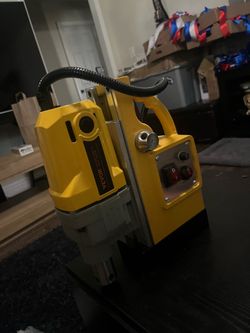 Magnetic base drill