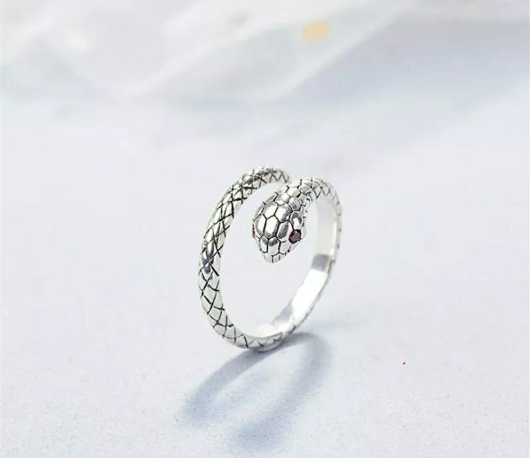snake silver ring with ruby inlayed eyes
