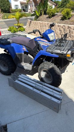 Polaris Sportsman 400 AWD and ramps