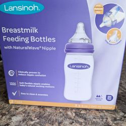 6 Lansinoh Bottles (New) For $20