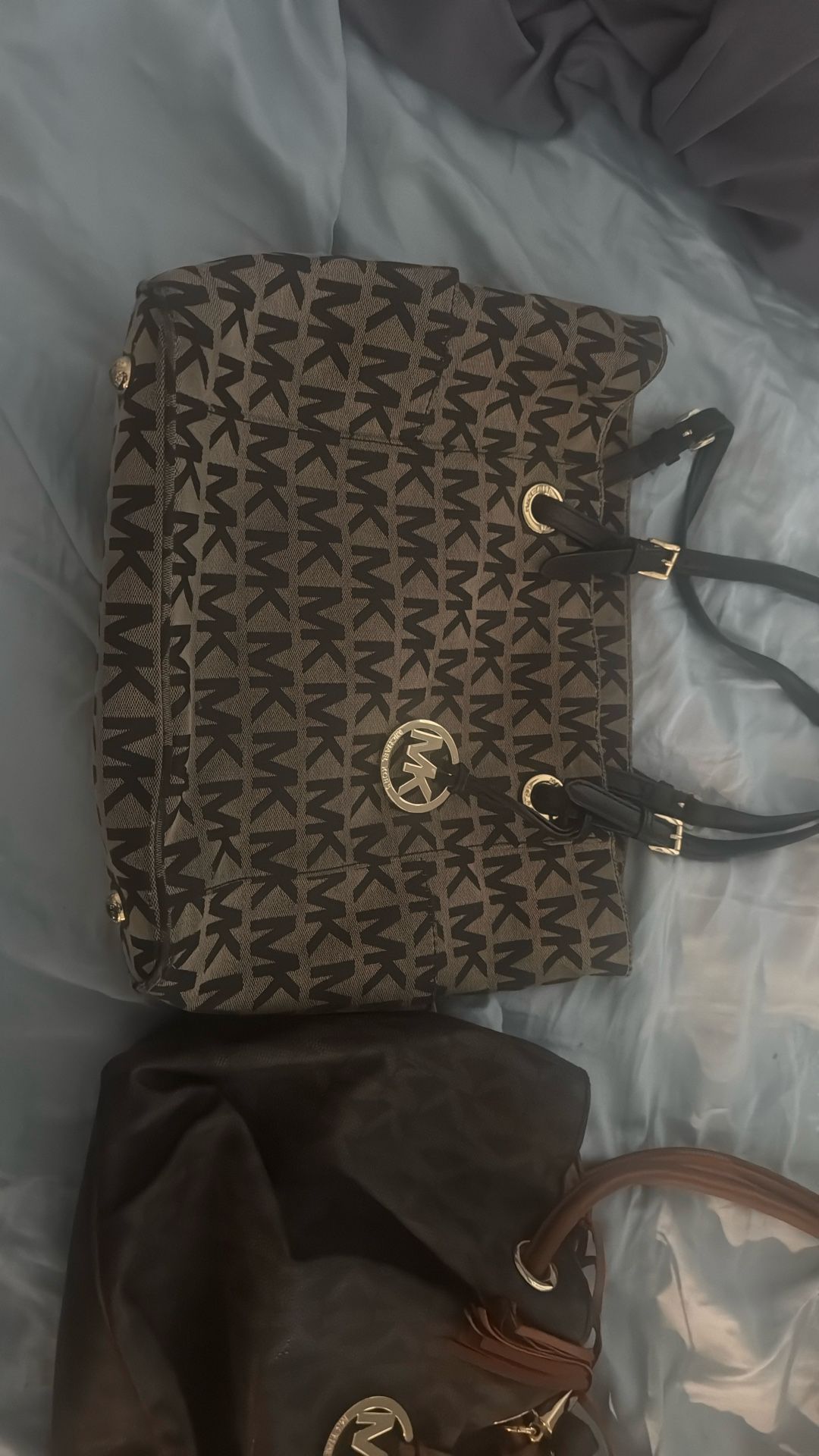 3 Michael Kors purse