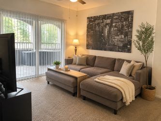 Living spaces chaise sectional and ottoman