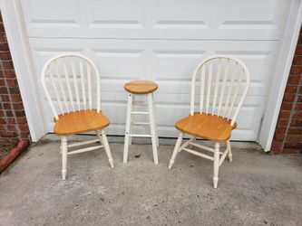 2 chairs and a bar stool